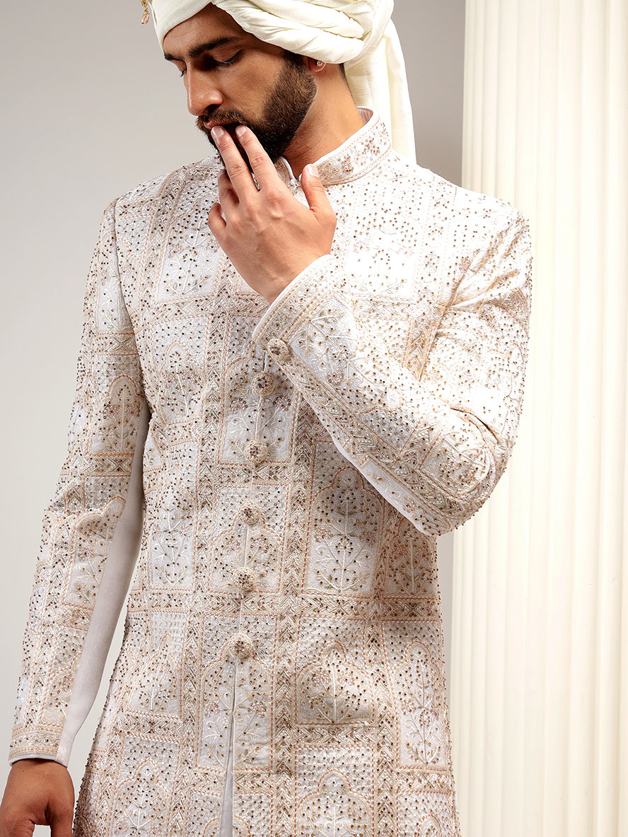 Enchanting Cream Color Self Embroidered Sherwani Set