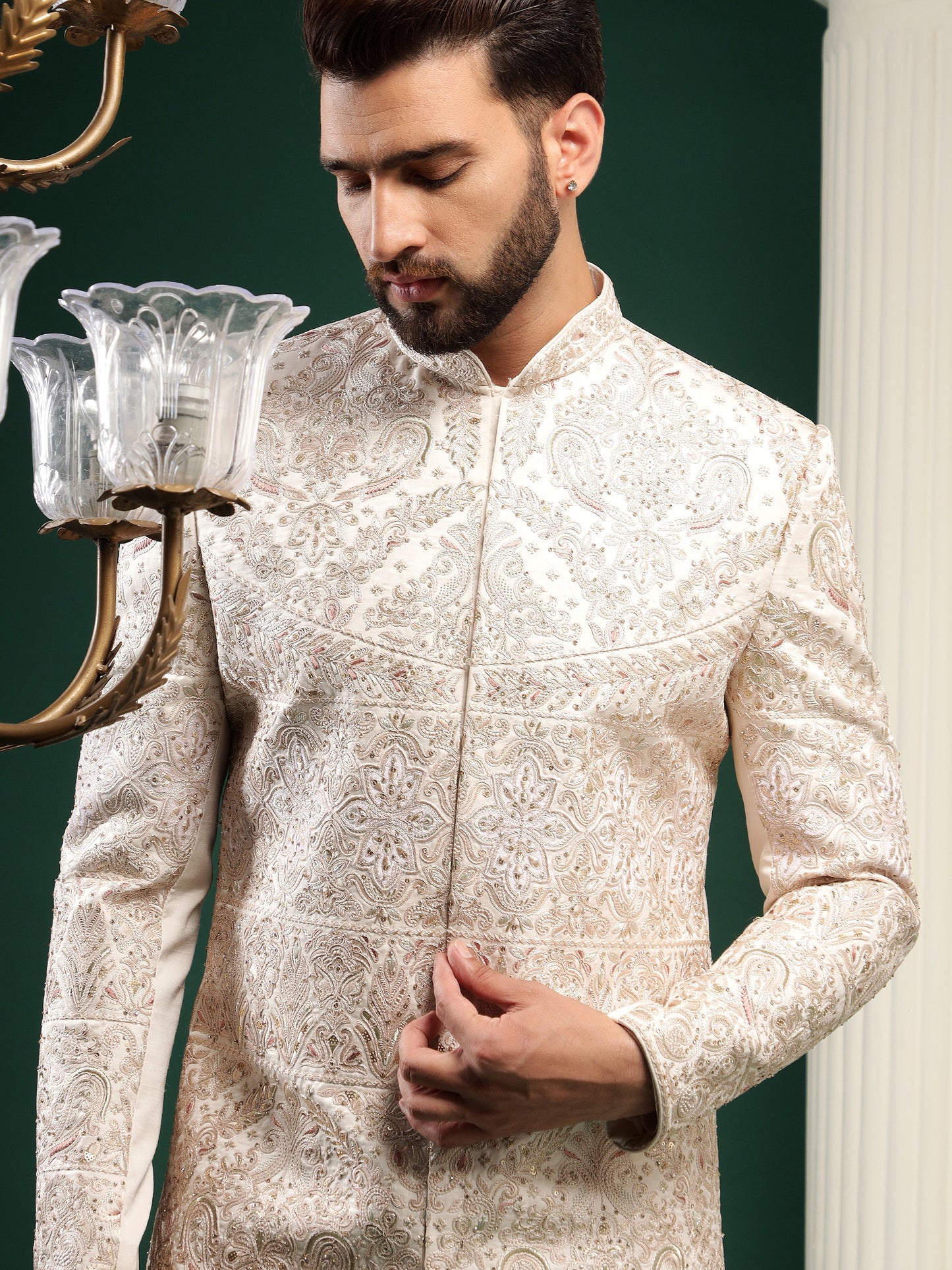 Rosegold color sherwani with heavy embroidery