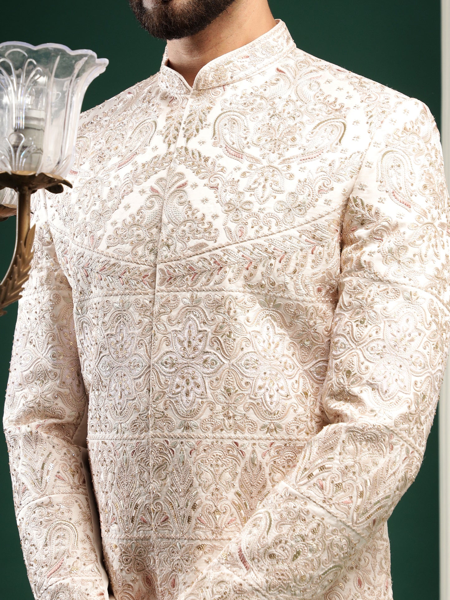 Rosegold color sherwani with heavy embroidery