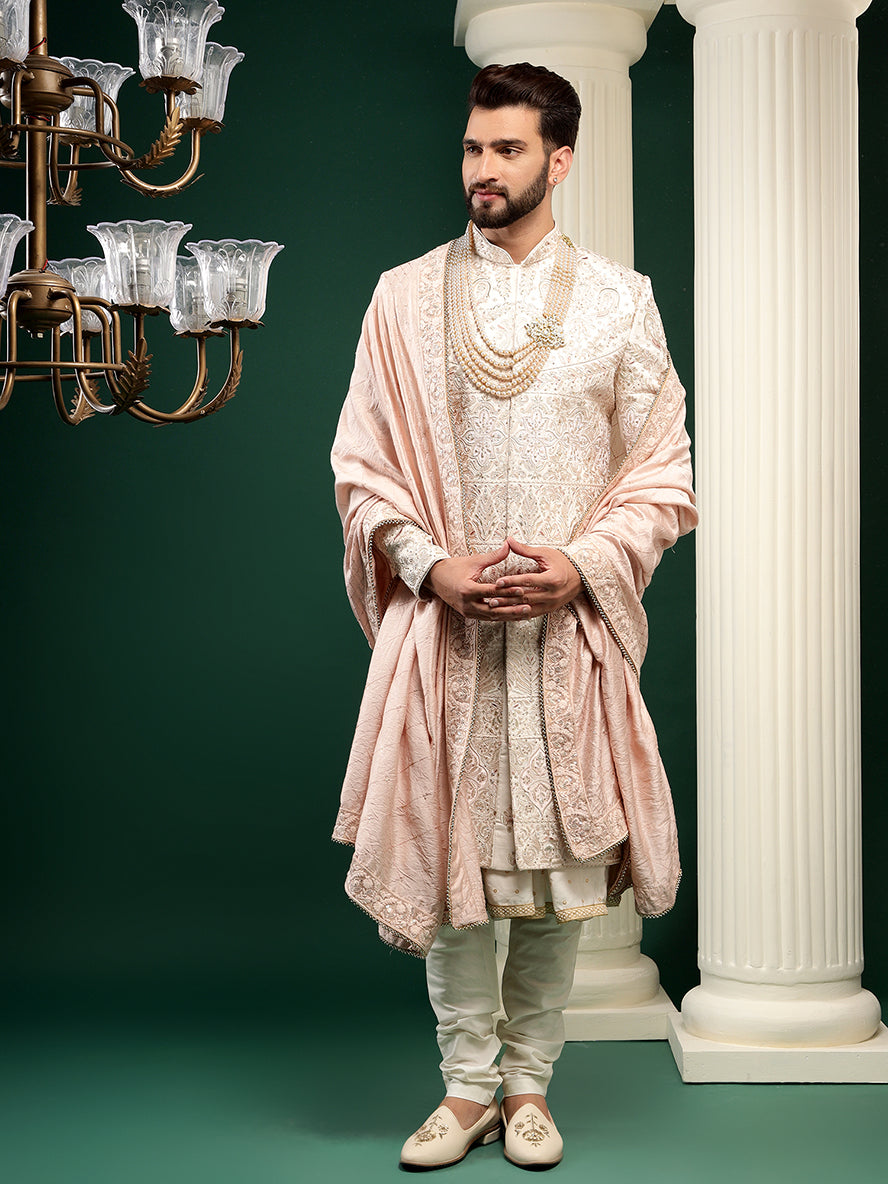 Rosegold color sherwani with heavy embroidery