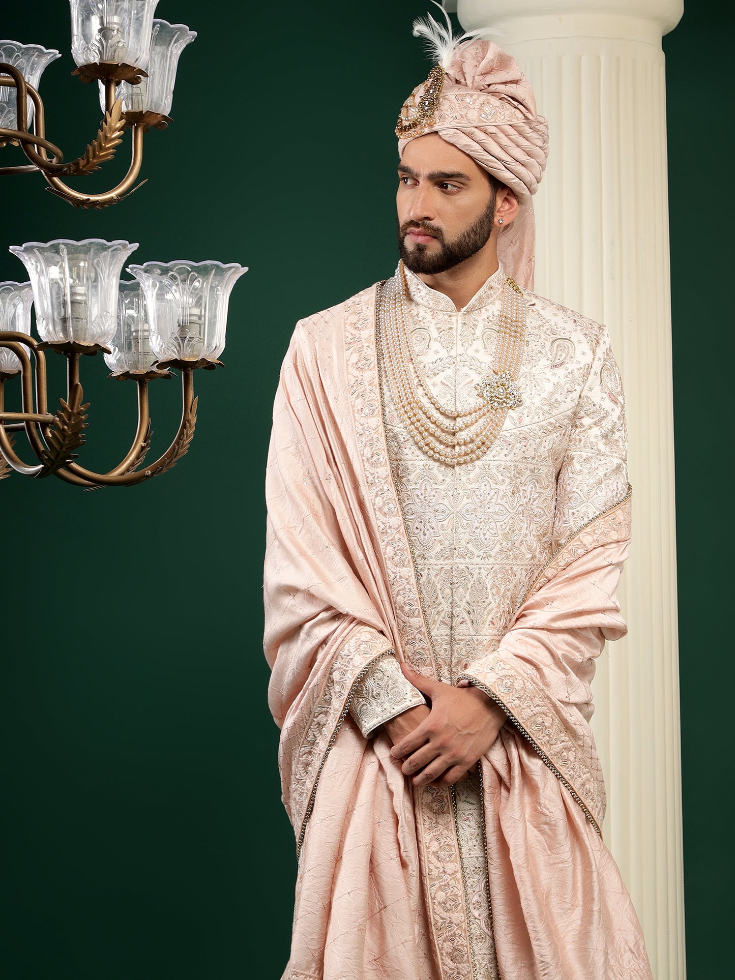 Rosegold color sherwani with heavy embroidery