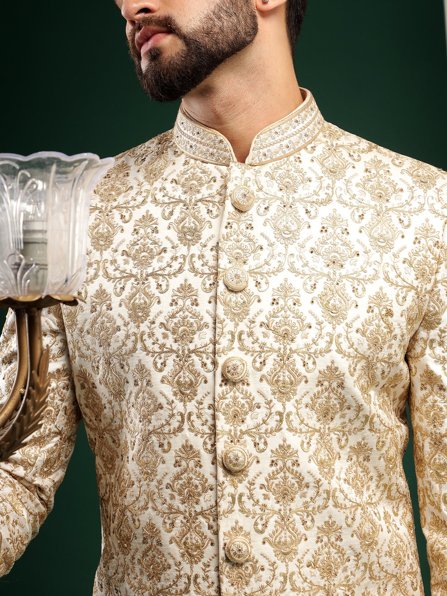 ENIGMATIC GOLD SHERWANI WITH TRADITIONAL MOTIFS