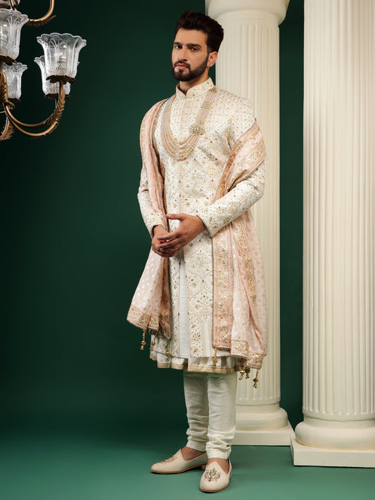 PEARL WHITE SHERWANI WITH PEACH MOTIFS