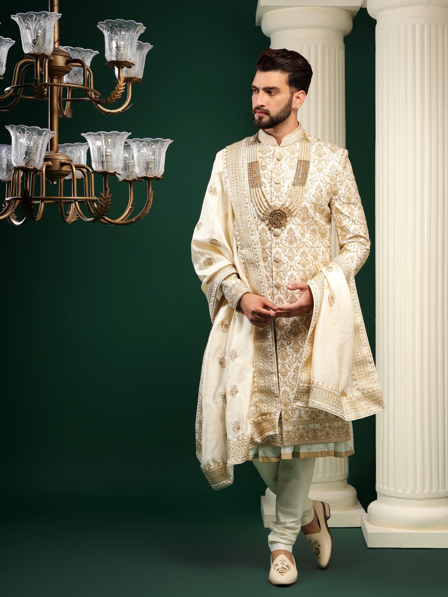 ENIGMATIC GOLD SHERWANI WITH TRADITIONAL MOTIFS