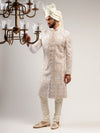 ENCHANTING CREAM COLOR SELF EMBROIDERED SHERWANI SET