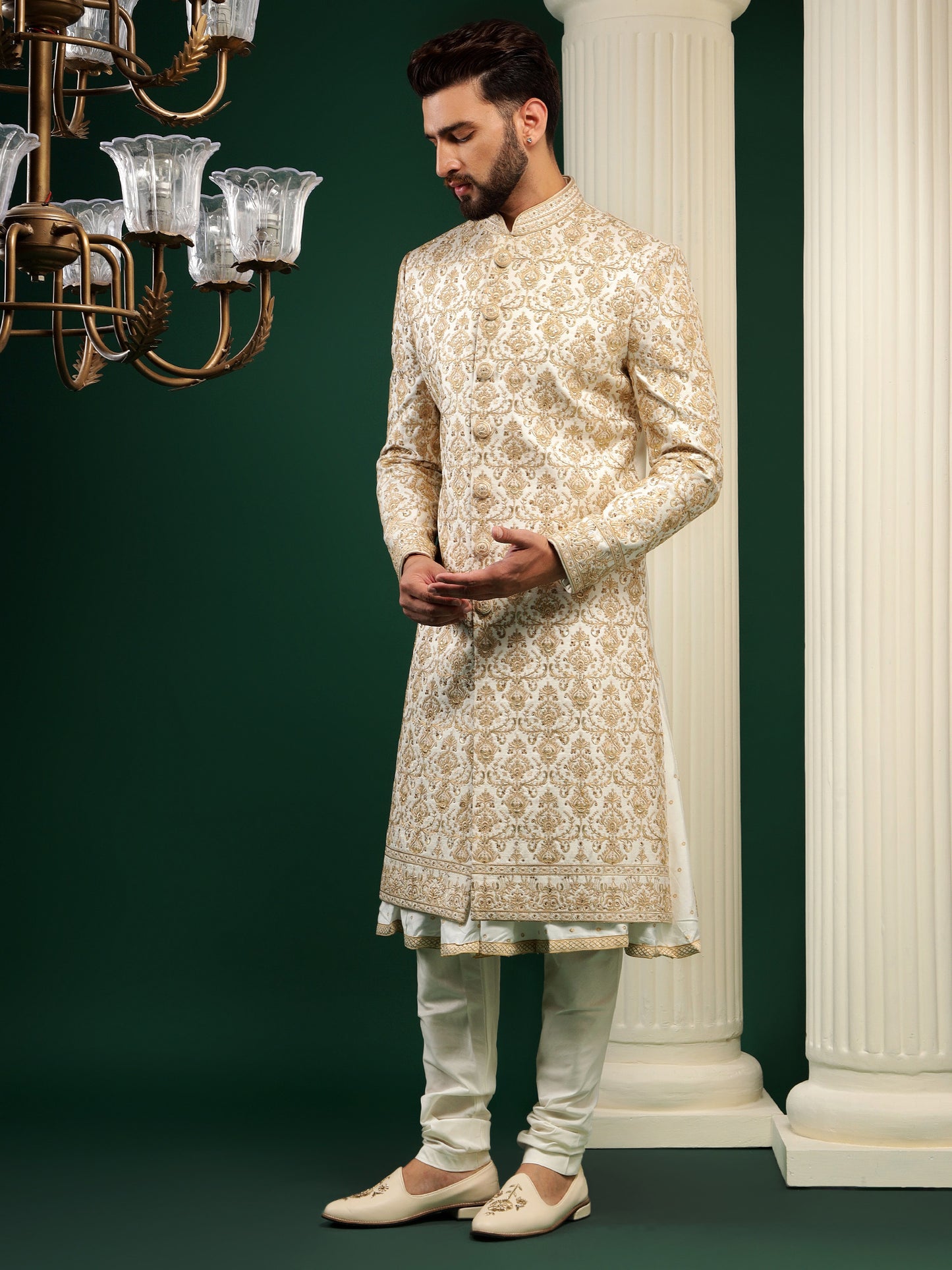 ENIGMATIC GOLD SHERWANI WITH TRADITIONAL MOTIFS