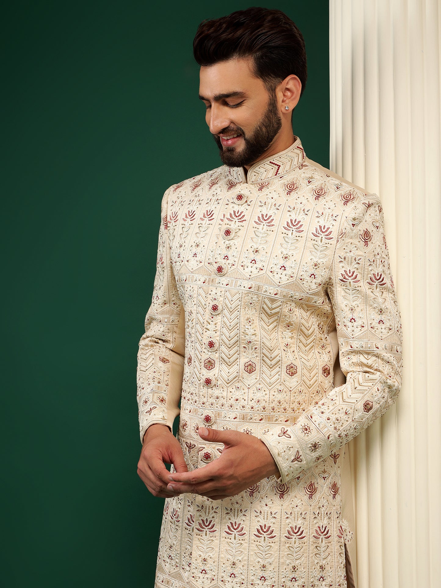 CLASSY CREAM SHERWANI WITH CONTRASTING MOTIFS