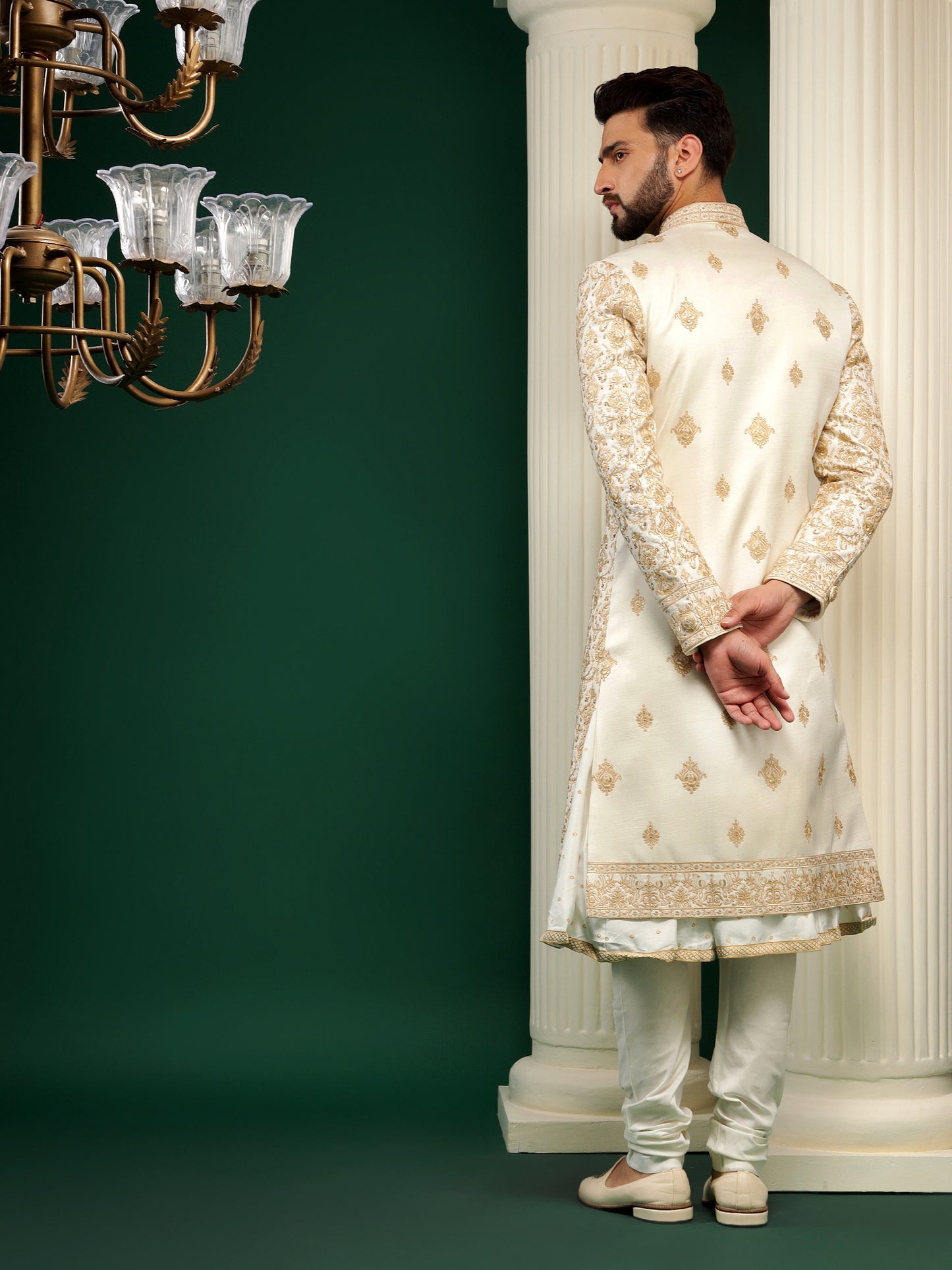 ENIGMATIC GOLD SHERWANI WITH TRADITIONAL MOTIFS