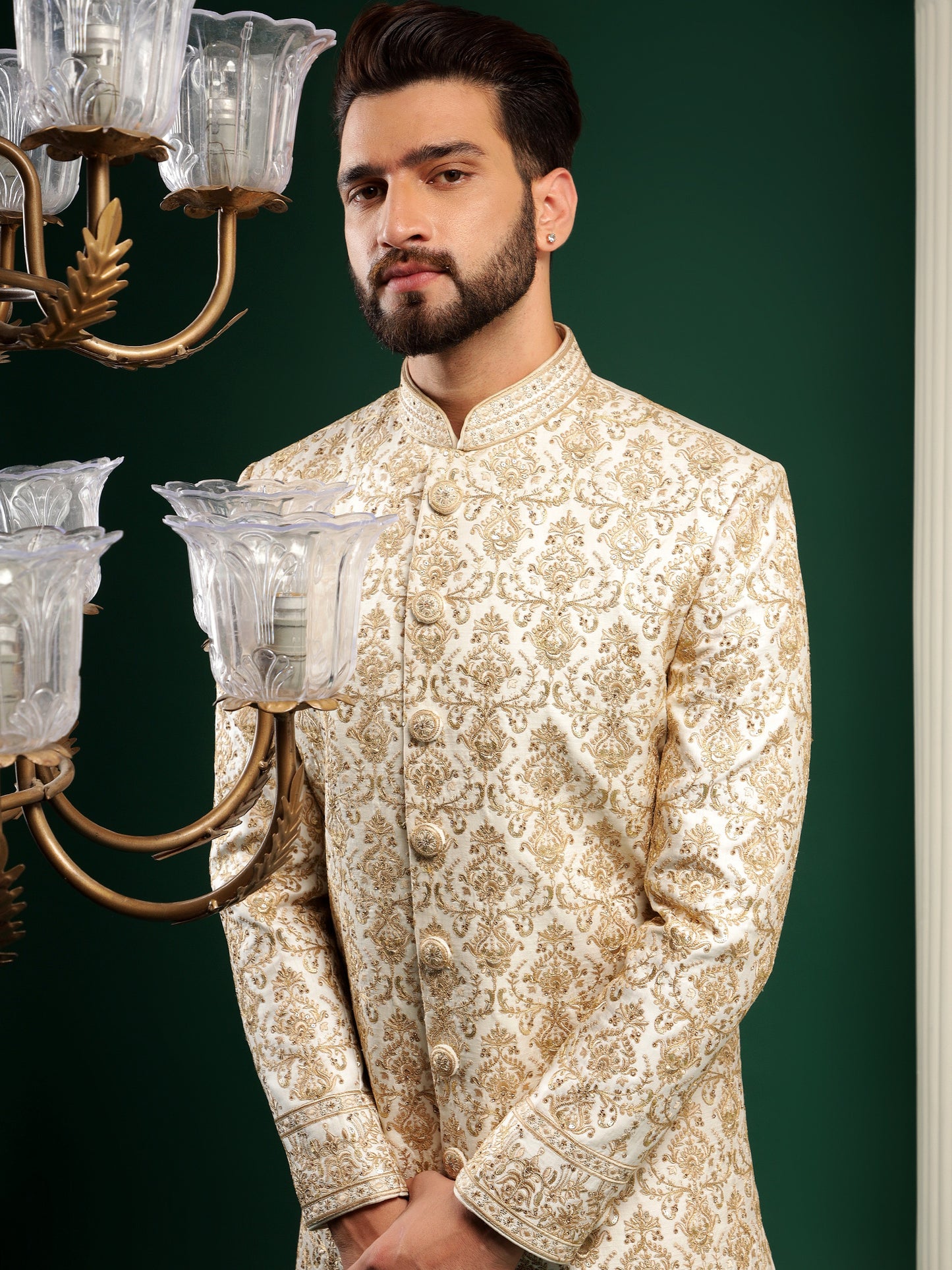 ENIGMATIC GOLD SHERWANI WITH TRADITIONAL MOTIFS