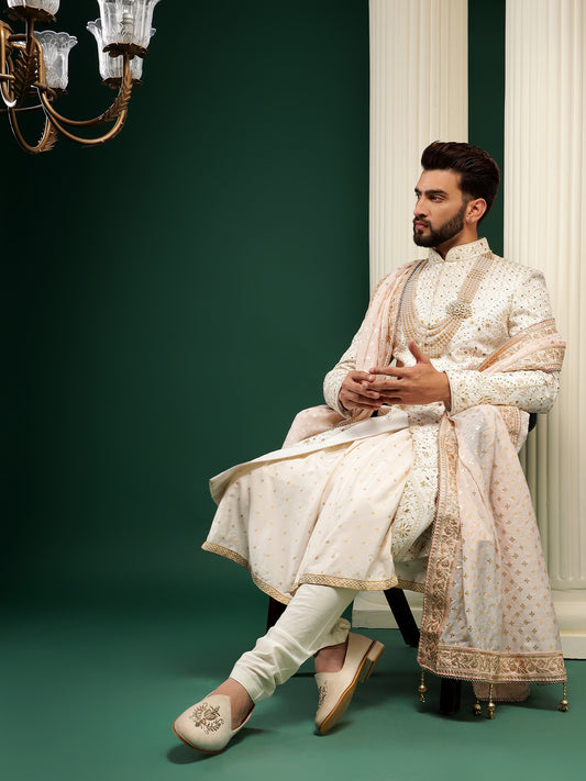 PEARL WHITE SHERWANI WITH PEACH MOTIFS