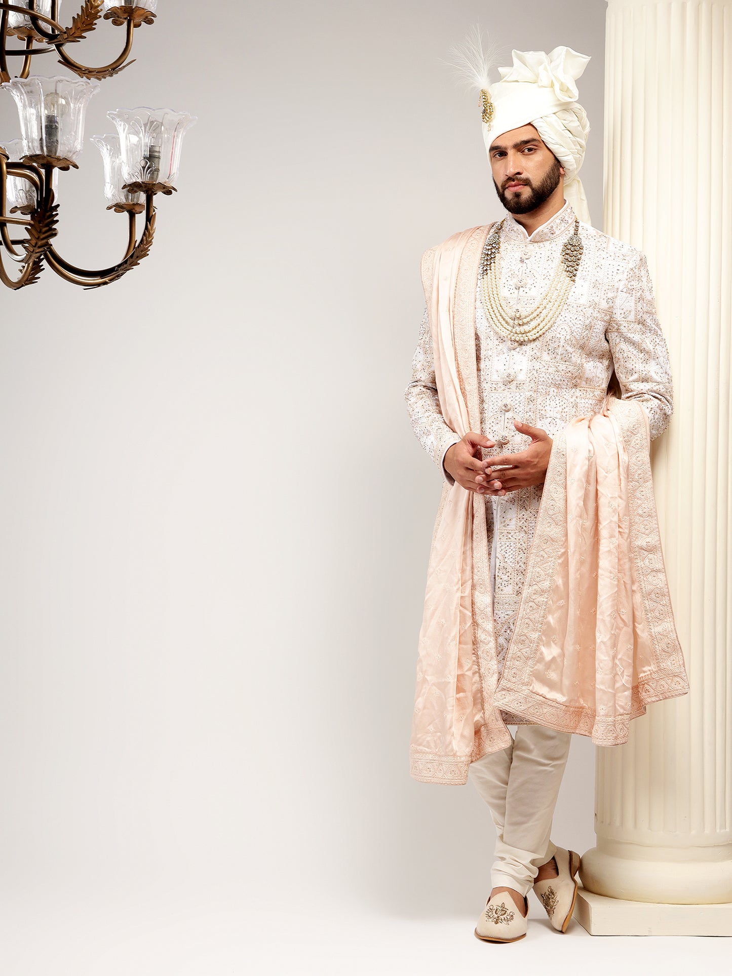 ENCHANTING CREAM COLOR SELF EMBROIDERED SHERWANI SET